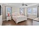 Bedroom with coral bedding and plenty of light at 304 Spartina Ct., North Myrtle Beach, SC 29582