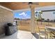 Brick patio with built-in grill and seating area overlooking the water at 304 Spartina Ct., North Myrtle Beach, SC 29582