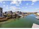 Aerial view of waterfront community with homes and canals at 324 56Th Ave. N, North Myrtle Beach, SC 29582