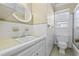 Clean bathroom with single sink vanity, toilet, and shower/tub combo at 324 56Th Ave. N, North Myrtle Beach, SC 29582