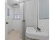 Small bathroom with pedestal sink and tiled floor at 324 56Th Ave. N, North Myrtle Beach, SC 29582