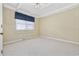 Spacious bedroom featuring carpeted floors and a ceiling fan at 324 56Th Ave. N, North Myrtle Beach, SC 29582