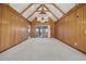 Living room with vaulted wood ceilings and carpeted floors at 324 56Th Ave. N, North Myrtle Beach, SC 29582