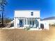 Home's backyard with a pergola and patio at 340 N Reindeer Rd., Surfside Beach, SC 29575