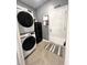 Laundry room with Samsung washer and dryer, and mini-fridge at 340 N Reindeer Rd., Surfside Beach, SC 29575