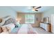 Large bedroom with king-size bed and plenty of natural light at 35 Delray Dr. # 1-B, Murrells Inlet, SC 29576