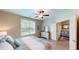 Comfortable main bedroom with king bed and access to a sitting area at 35 Delray Dr. # 1-B, Murrells Inlet, SC 29576