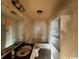 Bathroom with bathtub, sink, and built in shelving at 3757 Methodist Rehobeth Rd., Galivants Ferry, SC 29544