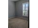 Bright bedroom with neutral walls and carpet flooring at 4085 Alvina Way, Myrtle Beach, SC 29579