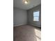 Well-lit bedroom featuring neutral walls and carpet at 4085 Alvina Way, Myrtle Beach, SC 29579