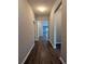 Light-filled hallway with hardwood floors leading to the main living areas at 4085 Alvina Way, Myrtle Beach, SC 29579