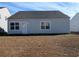 Single-Gathering home with gray siding and a small yard at 4085 Alvina Way, Myrtle Beach, SC 29579