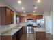 Modern kitchen with stainless steel appliances and granite countertops at 4085 Alvina Way, Myrtle Beach, SC 29579