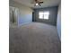 Large main bedroom with neutral walls and carpet at 4085 Alvina Way, Myrtle Beach, SC 29579