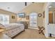 Bedroom with vaulted ceiling and ensuite bathroom at 4375 Winged Foot Ct., Myrtle Beach, SC 29579