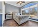 Bedroom with a view, hardwood floors, and a ceiling fan at 4375 Winged Foot Ct., Myrtle Beach, SC 29579