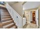 Elegant staircase leading to the lower level at 4375 Winged Foot Ct., Myrtle Beach, SC 29579