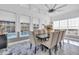 Sunroom with marble floors, large windows, and a dining table at 4375 Winged Foot Ct., Myrtle Beach, SC 29579