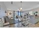 Living room and kitchen with dining table and ocean view at 4490 Little River Inn Ln. # 2203, Little River, SC 29566