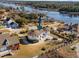 Aerial view of unique waterfront home with circular design at 4552 River Rd., Little River, SC 29566