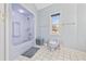 Bathroom includes a shower/tub combo and a window at 4552 River Rd., Little River, SC 29566