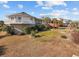 Two-story house with circular design, brick exterior, and palm trees at 4552 River Rd., Little River, SC 29566