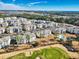 Aerial view of Myrtlewood Golf Resort community, showcasing buildings, pool, and golf course at 4886 Luster Leaf Circle # 404, Myrtle Beach, SC 29577