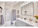 Modern bathroom with double vanity and shower/tub combo at 4886 Luster Leaf Circle # 404, Myrtle Beach, SC 29577