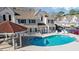 Communal kidney-shaped pool with gazebo at 500 Fairway Village Dr. # 7-F, Myrtle Beach, SC 29588