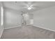 Bright bedroom with ceiling fan and gray carpeting at 5023 Sweet Birch Lane, Conway, SC 29526