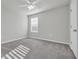 Spacious bedroom with ceiling fan and gray carpeting at 5023 Sweet Birch Lane, Conway, SC 29526