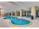 Indoor heated pool and hot tubs with large windows at 5310 N Ocean Blvd. N # 207, Myrtle Beach, SC 29577