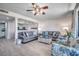 Bright living room with comfy sofas, a coffee table, and hardwood floors at 5310 N Ocean Blvd. N # 207, Myrtle Beach, SC 29577