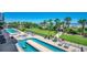 Resort-style pool area with ocean views and lush landscaping at 5310 N Ocean Blvd. N # 207, Myrtle Beach, SC 29577