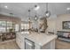 Large kitchen island with seating and modern pendant lighting at 5435 Shelly Lynn Dr., Myrtle Beach, SC 29579