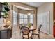 Charming breakfast nook with a bay window and built-in shelving at 58 Long Creek Dr., Murrells Inlet, SC 29576