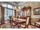 Elegant dining room with a large wood table and hutch at 58 Long Creek Dr., Murrells Inlet, SC 29576