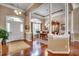 Elegant dining room with hardwood floors and a view to the entry at 58 Long Creek Dr., Murrells Inlet, SC 29576