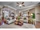 Bright and airy living room with hardwood floors and comfortable seating at 58 Long Creek Dr., Murrells Inlet, SC 29576