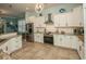 Bright kitchen with stainless steel appliances and ample counter space at 5808 Bridlewood Rd., North Myrtle Beach, SC 29582