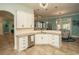 Modern kitchen featuring white cabinets and granite countertops at 5808 Bridlewood Rd., North Myrtle Beach, SC 29582