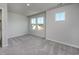 Bedroom with two windows and grey carpet at 592 Sea Sparrow St., Myrtle Beach, SC 29588