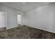 Well-lit bedroom with carpet and access to bathroom at 592 Sea Sparrow St., Myrtle Beach, SC 29588