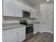 Stainless steel appliances and granite countertops in the modern kitchen at 592 Sea Sparrow St., Myrtle Beach, SC 29588