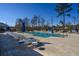 Community pool with lounge chairs and umbrellas at 592 Sea Sparrow St., Myrtle Beach, SC 29588