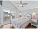 Bedroom with full bed and private balcony at 6001 - E-10 S Kings Hwy., Myrtle Beach, SC 29575