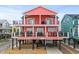 Two-story beach home with large decks and parking underneath at 6001 - E-10 S Kings Hwy., Myrtle Beach, SC 29575