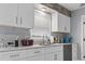 White kitchen with quartz countertop and new appliances at 603 Plantation Dr., Surfside Beach, SC 29575