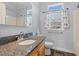 Bathroom with granite countertop, single sink vanity, and shower/tub at 6803 E Highway 19, Loris, SC 29569