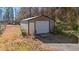 Metal storage shed with roll-up door and side door at 6803 E Highway 19, Loris, SC 29569